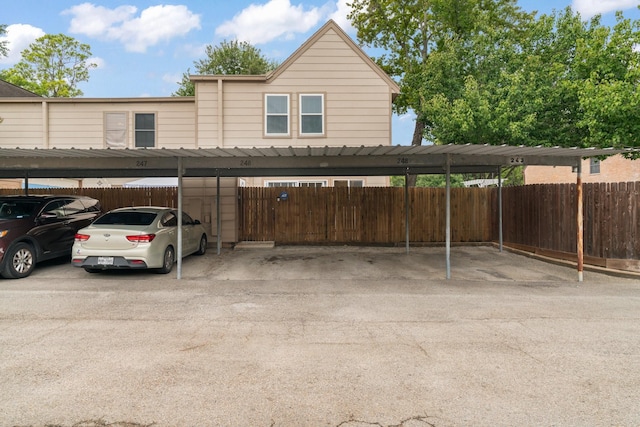 820 Threadneedle St Unit 248, Houston, TX 77079 - view of front of house featuring covered parking