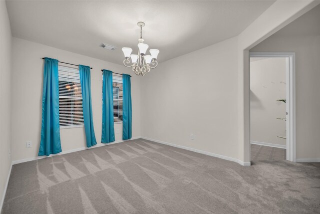 18423 Grove Brook Ln, Cypress, TX 77429 - carpeted empty room featuring a chandelier and baseboards