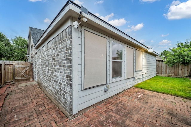 18423 Grove Brook Ln, Cypress, TX 77429 - view of side of property with a patio area and a fenced backyard