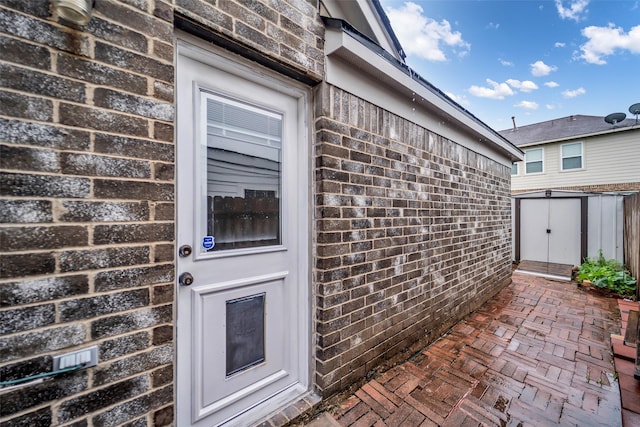 18423 Grove Brook Ln, Cypress, TX 77429 - doorway to property featuring brick siding