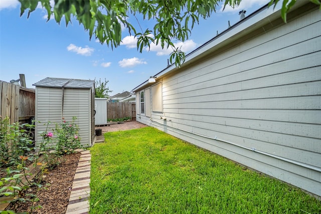 18423 Grove Brook Ln, Cypress, TX 77429 - fenced backyard featuring a storage shed