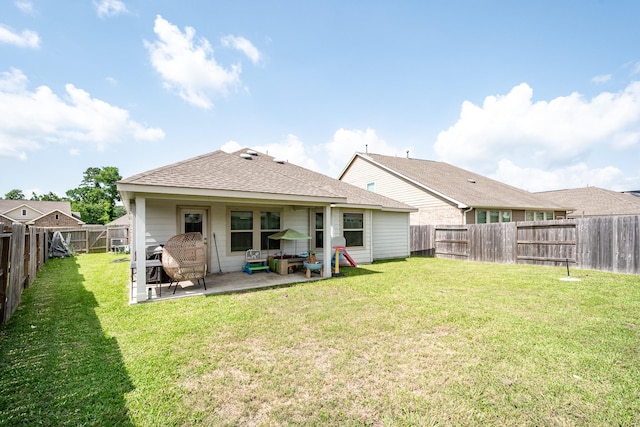 1004 Breech Dr, Crosby, TX 77532 - rear view of property featuring a patio and a shingled roof