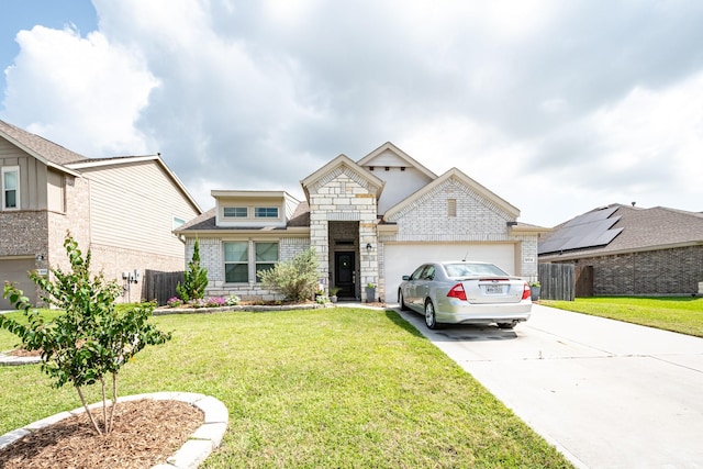 1004 Breech Dr, Crosby, TX 77532 - view of front of home featuring brick siding, an attached garage, concrete driveway, stone siding, and a shingled roof