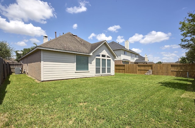 13012 Balsam Breeze Ln, Pearland, TX 77584 - back of property with central AC unit and brick siding