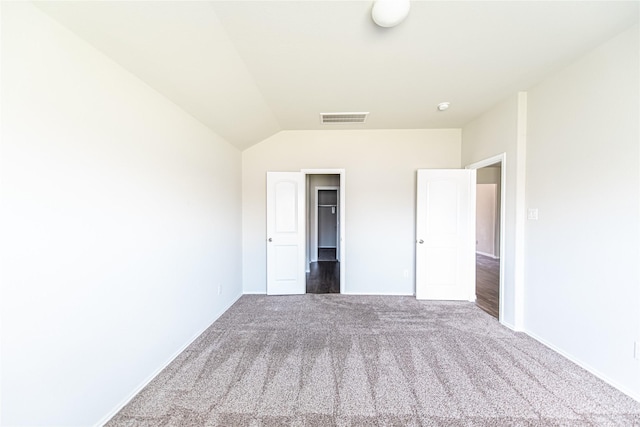 20910 Corisande St, Katy, TX 77449 - unfurnished bedroom featuring carpet floors, vaulted ceiling, baseboards, and a spacious closet