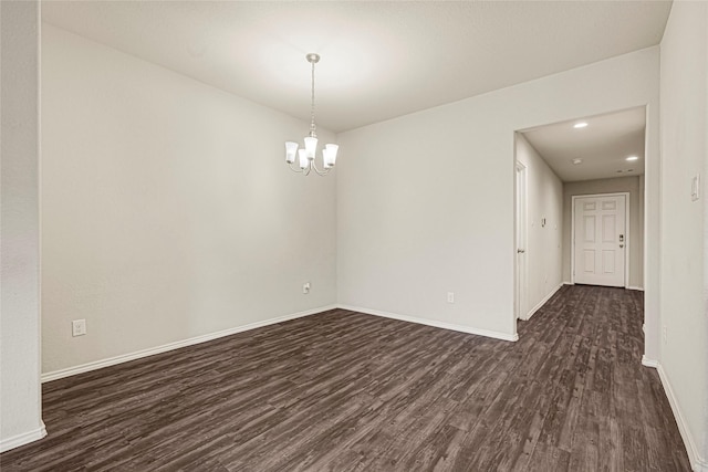 20910 Corisande St, Katy, TX 77449 - spare room with dark wood finished floors, a chandelier, and recessed lighting