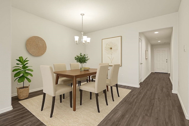 20910 Corisande St, Katy, TX 77449 - dining area with dark wood-style floors, a chandelier, and recessed lighting