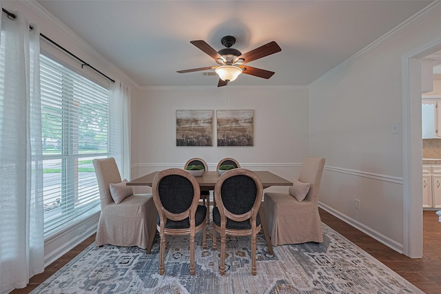 6526 Mert St, Katy, TX 77493 - dining area featuring a ceiling fan, ornamental molding, wood finished floors, and baseboards