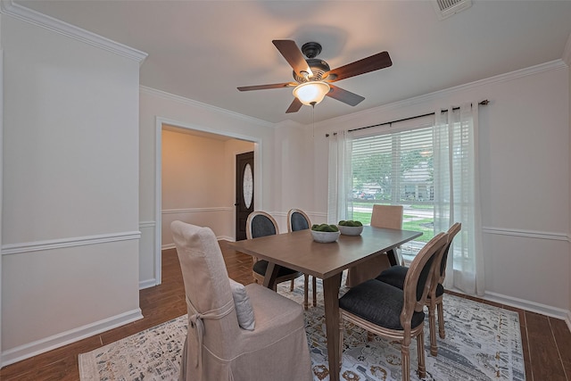 6526 Mert St, Katy, TX 77493 - dining area featuring crown molding, ceiling fan, wood finished floors, and baseboards