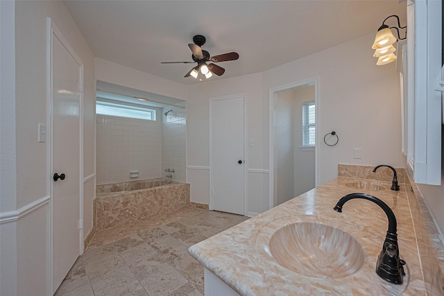 6526 Mert St, Katy, TX 77493 - full bath featuring double vanity, a ceiling fan, and a combined bath / shower with marble appearance