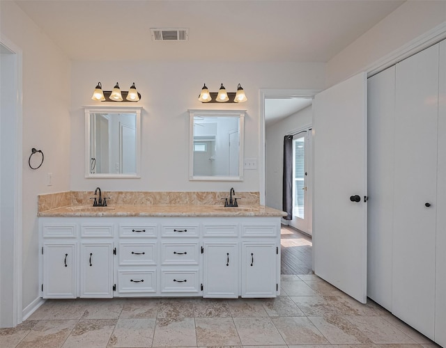 6526 Mert St, Katy, TX 77493 - bathroom featuring double vanity