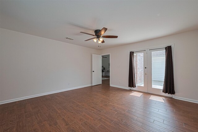 6526 Mert St, Katy, TX 77493 - spare room with dark wood-type flooring, a ceiling fan, and baseboards