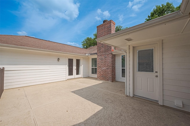 6526 Mert St, Katy, TX 77493 - view of patio / terrace with french doors