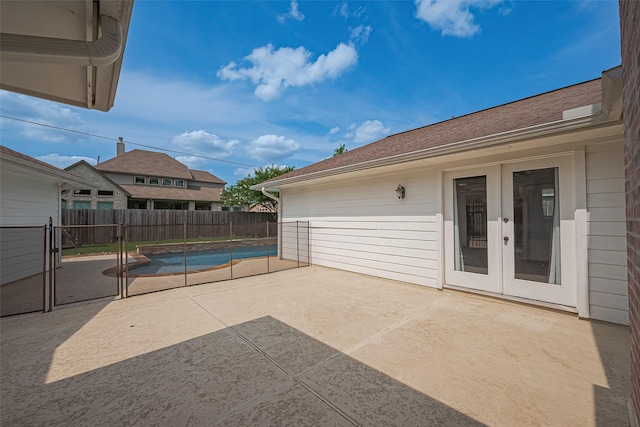 6526 Mert St, Katy, TX 77493 - view of patio with french doors