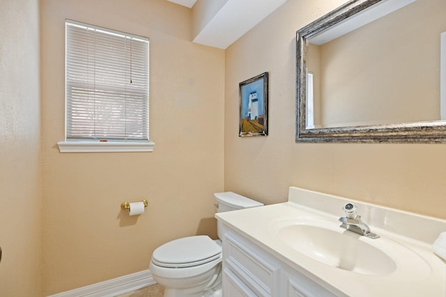12910 Lake Mist Dr, Cypress, TX 77429 - half bath featuring toilet, vanity, and baseboards