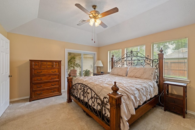 12910 Lake Mist Dr, Cypress, TX 77429 - bedroom with light carpet, ceiling fan, baseboards, and lofted ceiling