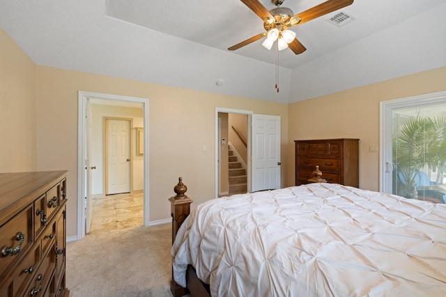 12910 Lake Mist Dr, Cypress, TX 77429 - bedroom with light carpet, a ceiling fan, baseboards, and vaulted ceiling