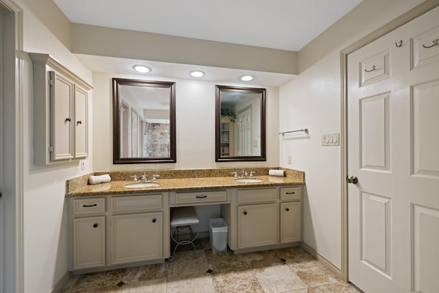 12910 Lake Mist Dr, Cypress, TX 77429 - full bathroom with double vanity and baseboards