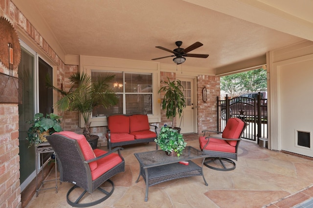12910 Lake Mist Dr, Cypress, TX 77429 - view of patio / terrace with a ceiling fan, an outdoor hangout area, and a gate