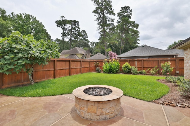 12910 Lake Mist Dr, Cypress, TX 77429 - view of patio featuring an outdoor fire pit