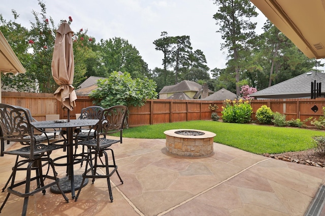 12910 Lake Mist Dr, Cypress, TX 77429 - view of patio / terrace featuring a fire pit and outdoor dining space