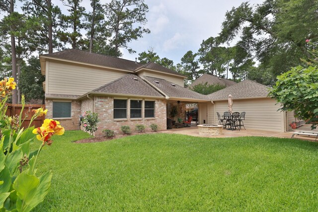 12910 Lake Mist Dr, Cypress, TX 77429 - rear view of house with ceiling fan, a patio, roof with shingles, and brick siding