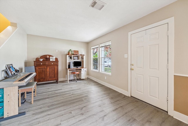 18614 Atasca Oaks Dr, Humble, TX 77346 - home office with light wood finished floors and baseboards