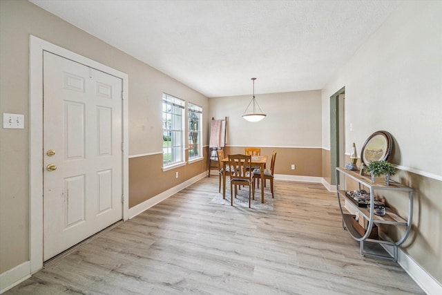 18614 Atasca Oaks Dr, Humble, TX 77346 - dining space with light wood-type flooring and baseboards