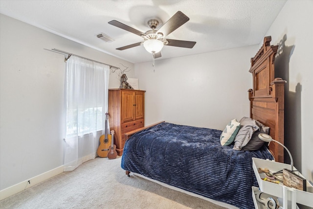 18614 Atasca Oaks Dr, Humble, TX 77346 - bedroom featuring light colored carpet, baseboards, and ceiling fan