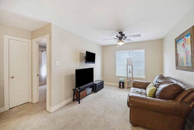 18614 Atasca Oaks Dr, Humble, TX 77346 - living room with light carpet, ceiling fan, and baseboards