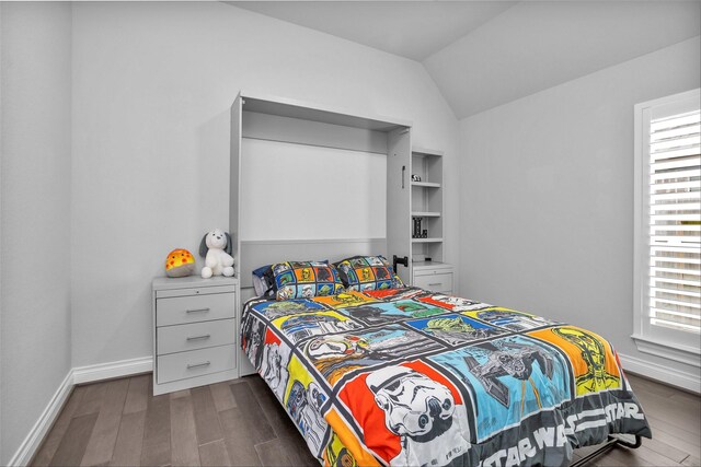 20423 Noble Arabian Dr, Tomball, TX 77377 - bedroom with dark wood-style floors and vaulted ceiling