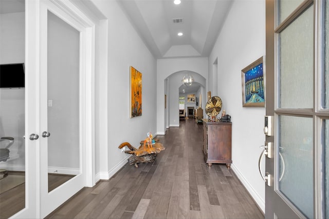 20423 Noble Arabian Dr, Tomball, TX 77377 - hallway featuring arched walkways, dark wood-style flooring, vaulted ceiling, and recessed lighting