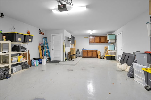 20423 Noble Arabian Dr, Tomball, TX 77377 - garage featuring a garage door opener