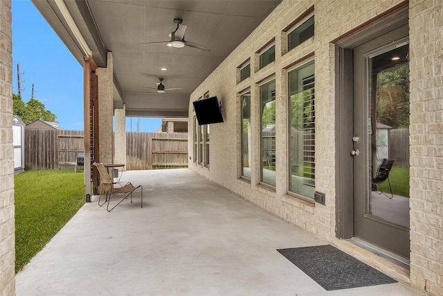 20423 Noble Arabian Dr, Tomball, TX 77377 - fenced backyard featuring ceiling fan and a patio