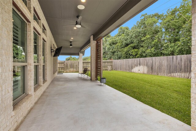 20423 Noble Arabian Dr, Tomball, TX 77377 - fenced backyard featuring a ceiling fan and a patio