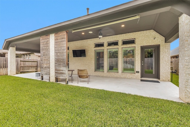 20423 Noble Arabian Dr, Tomball, TX 77377 - back of house with a patio, a ceiling fan, and stone siding