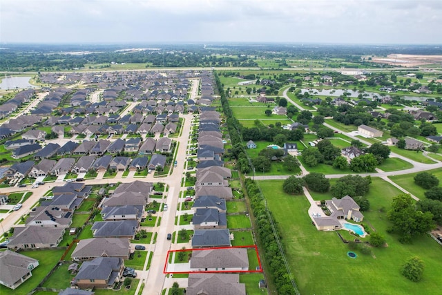 20423 Noble Arabian Dr, Tomball, TX 77377 - aerial overview of property's location featuring a nearby body of water, property boundaries highlighted, and nearby suburban area