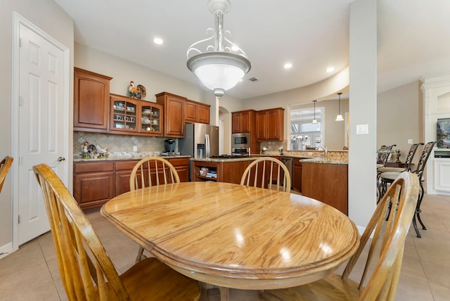 25514 Long Iron Ct, Spring, TX 77389 - dining room featuring light tile patterned floors and recessed lighting