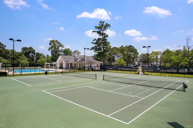 25514 Long Iron Ct, Spring, TX 77389 - view of tennis court with community basketball court