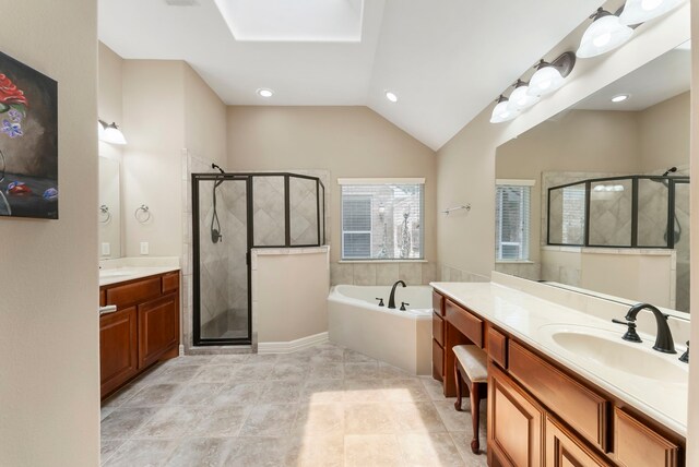 25514 Long Iron Ct, Spring, TX 77389 - full bath featuring a shower stall, a garden tub, two vanities, vaulted ceiling, and tile patterned floors
