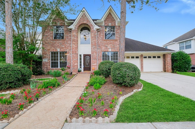 3606 Mira Glen Dr, Pearland, TX 77584 - traditional-style house with an attached garage, concrete driveway, and brick siding
