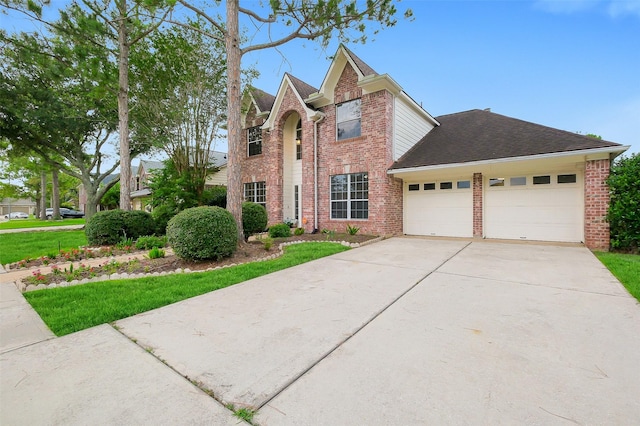 3606 Mira Glen Dr, Pearland, TX 77584 - view of front of property featuring a garage, brick siding, driveway, roof with shingles, and a front lawn