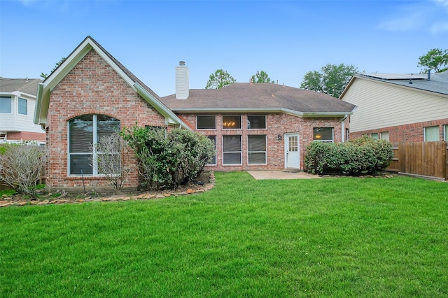 3606 Mira Glen Dr, Pearland, TX 77584 - rear view of property featuring a chimney, brick siding, and a shingled roof