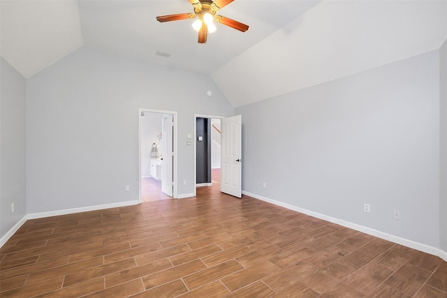 3606 Mira Glen Dr, Pearland, TX 77584 - unfurnished bedroom with vaulted ceiling, wood finished floors, baseboards, and connected bathroom