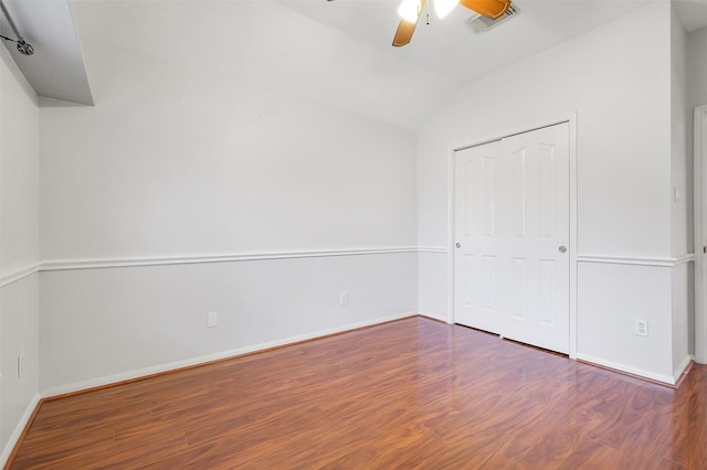 3606 Mira Glen Dr, Pearland, TX 77584 - unfurnished bedroom with wood finished floors, vaulted ceiling, baseboards, and a closet