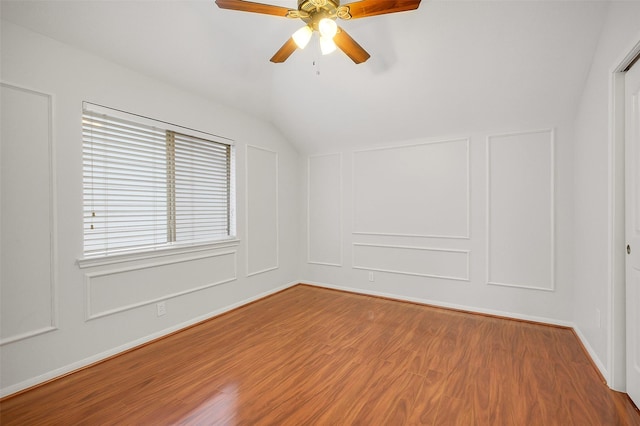 3606 Mira Glen Dr, Pearland, TX 77584 - bonus room with lofted ceiling, wood finished floors, ceiling fan, a decorative wall, and baseboards