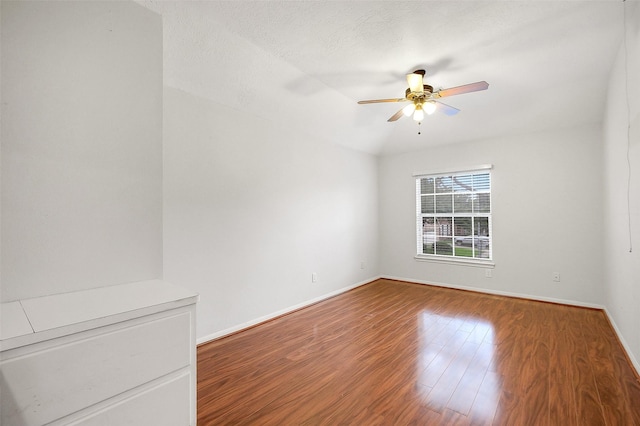 3606 Mira Glen Dr, Pearland, TX 77584 - unfurnished room with a ceiling fan, wood finished floors, and baseboards