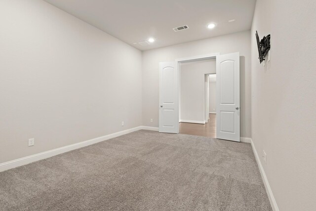 27423 Parker Spring Ct, Katy, TX 77494 - empty room featuring carpet floors, baseboards, and recessed lighting