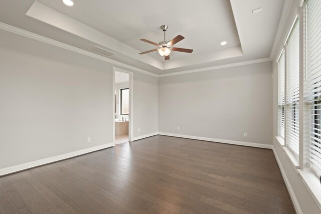 27423 Parker Spring Ct, Katy, TX 77494 - unfurnished room with a raised ceiling, ceiling fan, baseboards, dark wood finished floors, and recessed lighting