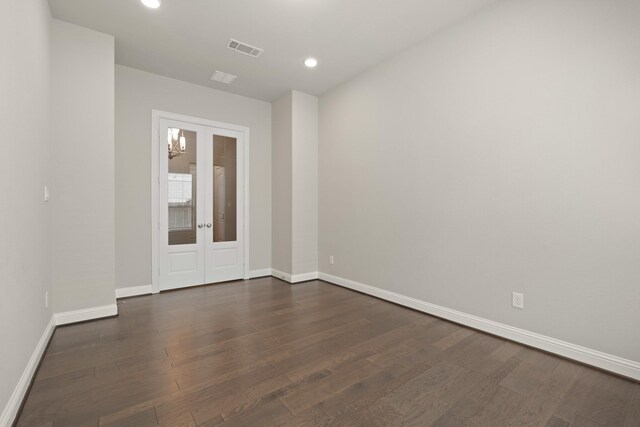 27423 Parker Spring Ct, Katy, TX 77494 - unfurnished room with french doors, dark wood-style flooring, baseboards, and recessed lighting